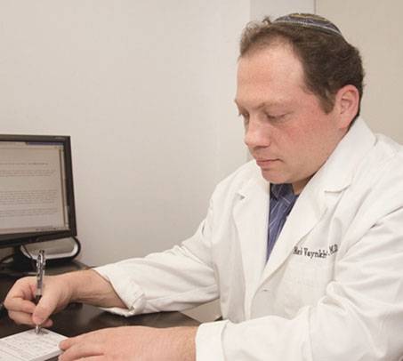 Dr. Mark Vaynkhadler,